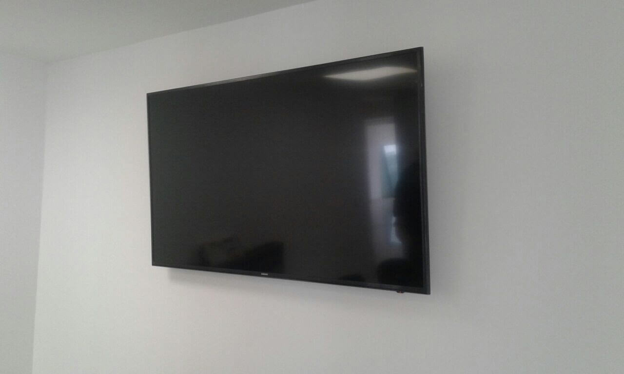 Soporte de pared con brazo doble resistente a televisores grandes Soporte de pared con brazo doble resistente a televisores grandes