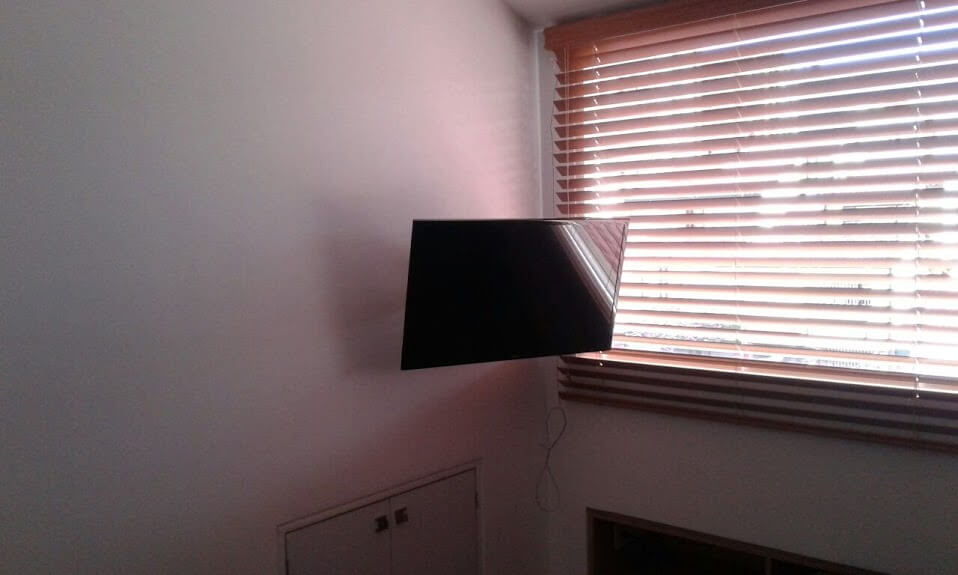 Soporte de brazo instalado en esquina de pared Soporte de brazo instalado en esquina de pared