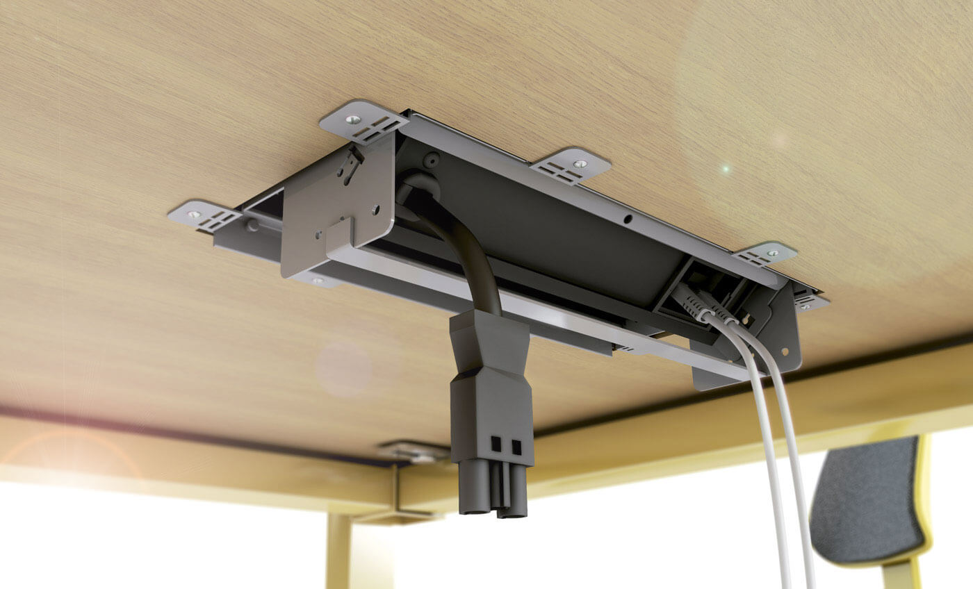 Grommet para oficinas con sistema de ocultamiento dentro del escritorio Grommet para oficinas con sistema de ocultamiento dentro del escritorio
